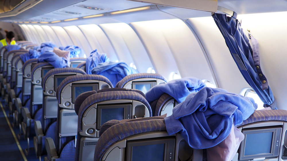 airline cabin being cleaned