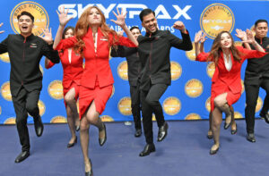 AirAsia cabin crew entertain guests with a pre-awards dance performance