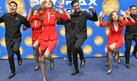 AirAsia cabin crew entertain guests with a pre-awards dance performance